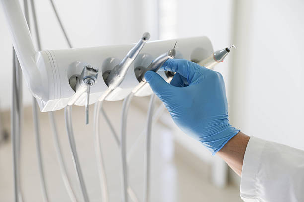 Professional Tooth Extraction technician working in Laguna Beach, CA